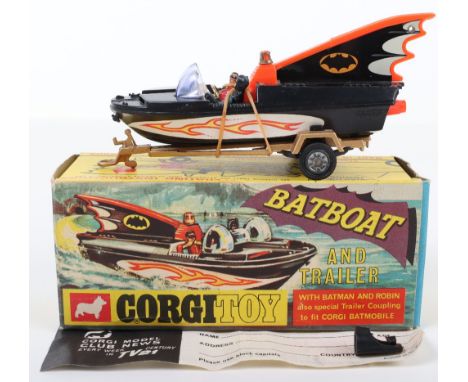 Corgi Toys 107 Batboat And Trailer,1st issue with tinplate fin cover, complete with original Batman &amp; Robin figures, gold