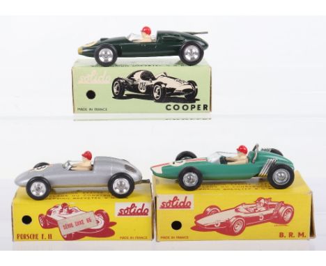 Three Solido (France) Boxed Racing Cars, 116 Cooper British racing green, spun wheel hubs, driver no’3’ 117 Porsche F.II, sil