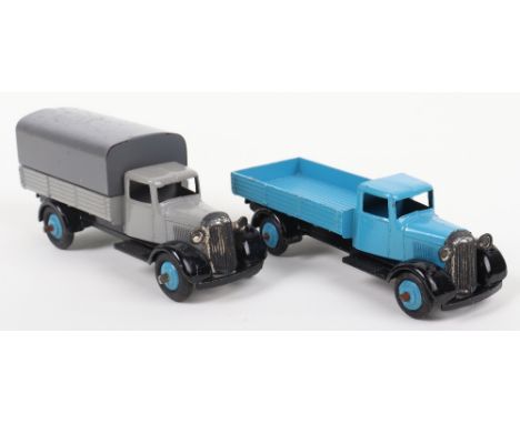 Dinky Toys Post War 25a Wagon, type 4, mid blue body/wheel hubs and 25b Covered wagon, type 4, dark grey tilt, light grey bod