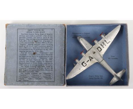 Dinky Toys Pre War 60r Empire Flying Boat ‘Canopus’ silver body, G-A DHL, 4 x 3 blade propellers, red plastic roller, in fair