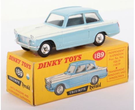 Dinky Toys 189 Triumph Herald light blue/white body, spun wheel hubs, in near mint original condition, with illustrated box, 