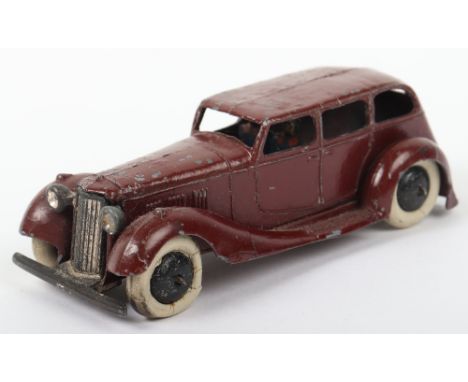 Scarce Dinky Toys Pre-War 36a Armstrong Limousine, with driver and footman, maroon, black smooth wheel hubs, in fair to good 