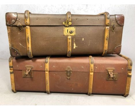 Two wooden bound vintage travel trunks