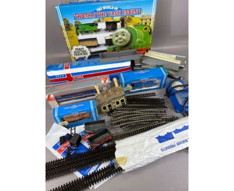 Collection of OO gauge model railway items: track, locomotives, carriages and accessories, to include Peco, Hornby and Llima