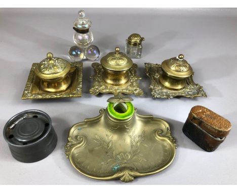 Collection of inkwells, four in brass with ceramic or glass wells, two glass, one pewter and one travel inkwell (A/F) (8)