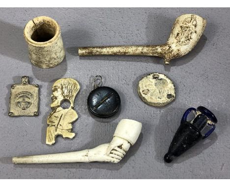 Interesting collection of curios to include an early scrimshaw figure, two vintage clay pipes, one with depiction of Queen Vi