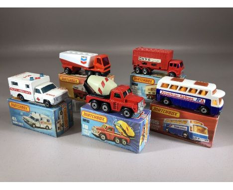 Five boxed Matchbox Superfast diecast model vehicles:19 Cement Truck, 41 Ambulance, 42 Mercedes Container Truck, 63 Freeway G