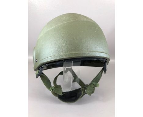 British military army uniform combat helmet ' MK 6 ', Dated 1990/91, having a khaki green shell, padded interior and label to