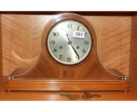 A lovely 1930's ivory inlaid mantle clock, W. 43cm, H. 27cm.