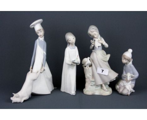 Four Lladro bisque porcelain figures of children, tallest 24cm. Condition: candle stick detached from hand, otherwise conditi