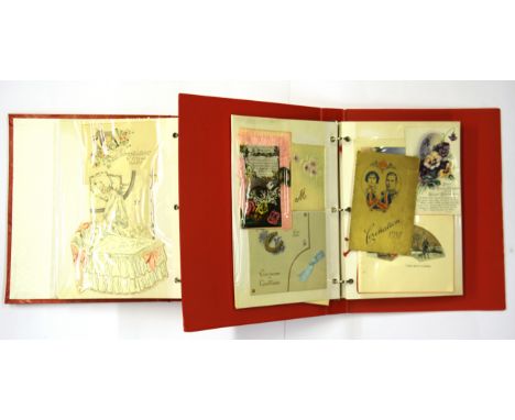 Two albums of vintage greeting and postcards.