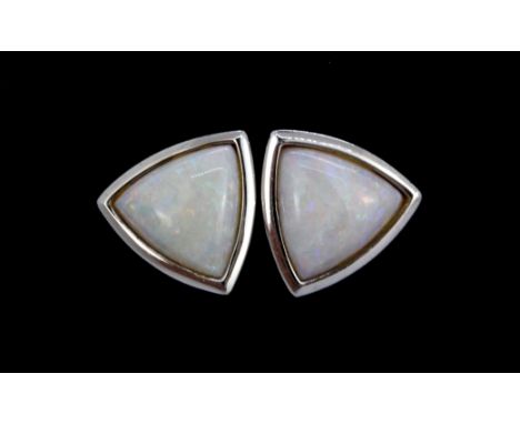 A pair of 18ct yellow and white gold opal set earrings, L. 1.1cm.