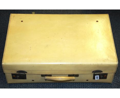 A vintage pig skin suitcase, size 61 x 40 x 20cm.