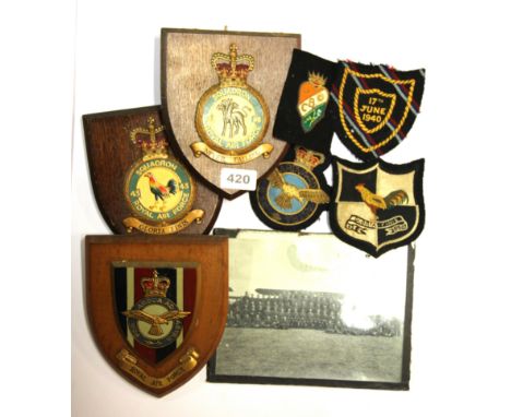 Three Royal Air Force shields and a vintage RAF photograph, together with four blazer badges.