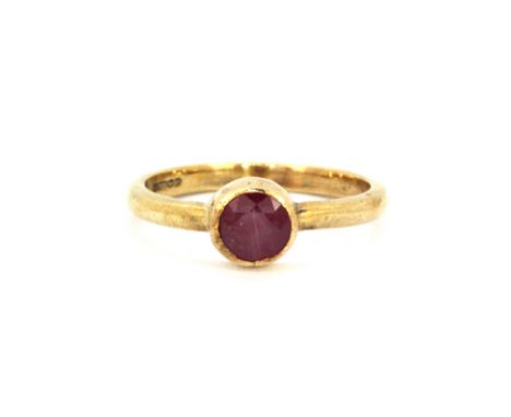 A 9ct yellow gold ruby set ring, (L).