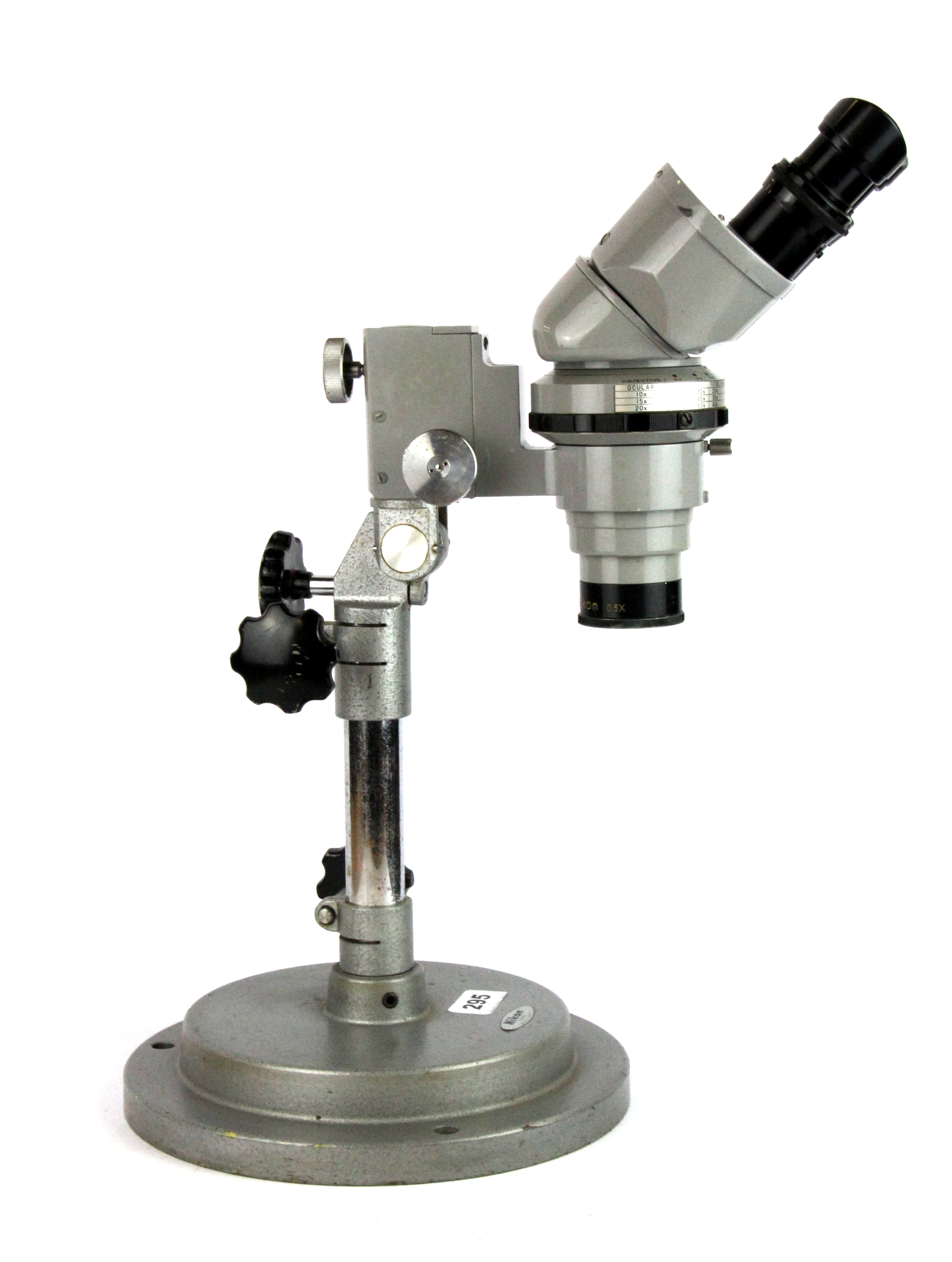A Nikon binocular microscope, H. 46cm.