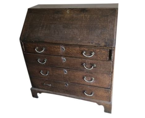 A George III oak bureau, with fall flap revealing a fitted interior over four graduated drawers with bracket feet, 92cm wide.