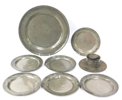 A group of 18thC and later pewter, comprising an inkwell, large charger, 36cm diameter, stamped B A, and a set of six small p