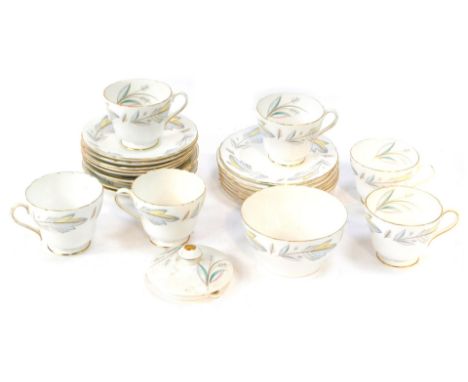 A Shelley Caprice pattern part tea service, comprising sugar bowl, teapot lid, six cups, five saucers, four breakfast cup sau