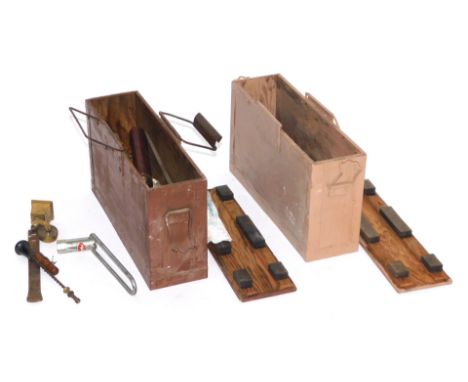 Two brown painted wooden and metal ammunition case, 22cm high, 40cm wide, 11cm deep, and various tools. 