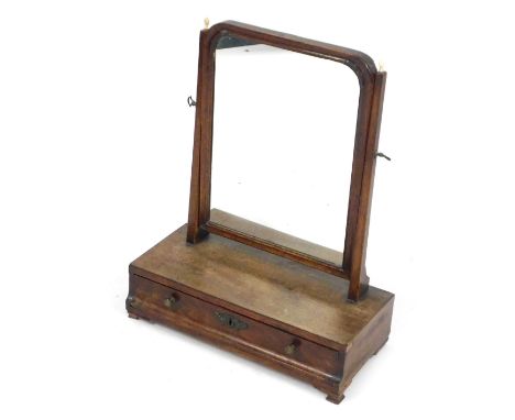 A 19thC mahogany swing frame mirror, the rectangular plate on square tapering supports, each with turned bone finials, the ba