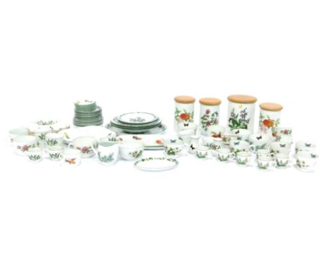 A group of Royal Worcester Worcester Herbs pattern tea wares, comprising kitchen cannisters, cups and saucers, soup bowls, mi