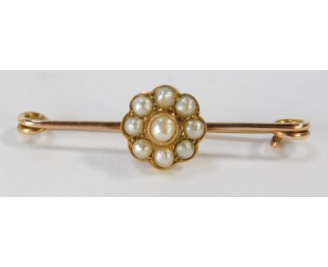 A cultured pearl bar brooch, the central cluster design set with an arrangement of cluster pearls, in yellow metal frame, unm