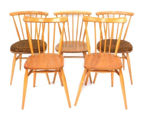 A set of five Ercol light elm spindle back kitchen chairs.