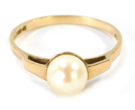 A 9ct gold cultured pearl dressing ring, the single cultured pearl in a tension raised setting, size N ½, 1.7g all in.