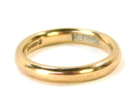 A 9ct gold wedding band, of plain design, size K ½, 3.4g.