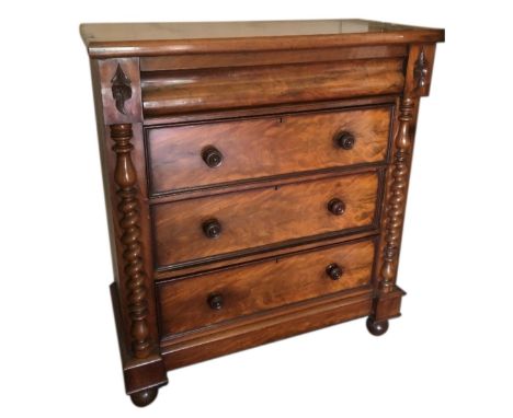 A Victorian flamed mahogany Scotch chest, of four graduated drawers, the top being a cushion drawer, 105cm wide.