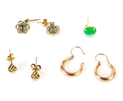 A group of earrings, comprising a pair of 9ct rose gold hoop earrings, a pair of 9ct cluster stud earrings, a pair of 9ct gol