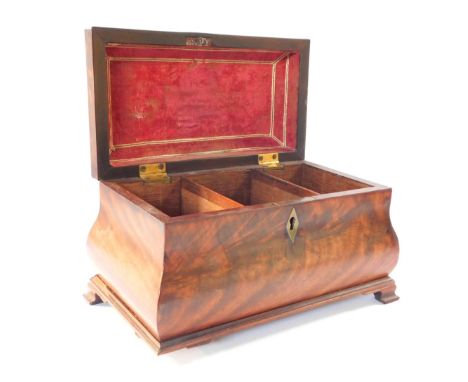 A George III flame mahogany bombe tea caddy, with brass swan neck handle and ogee bracket feet (AF), 17cm high, 26cm wide.