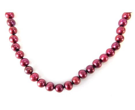 A cultured pearl necklace, with red lustre finish on string strand with 9ct gold marquis shaped clasp, 46cm long, 28.8g all i