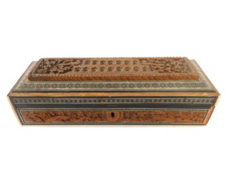 An Indian carved hardwood box, with mother of pearl and bone mosaic detail, 6cm high, 29cm wide, 12cm deep. (AF)