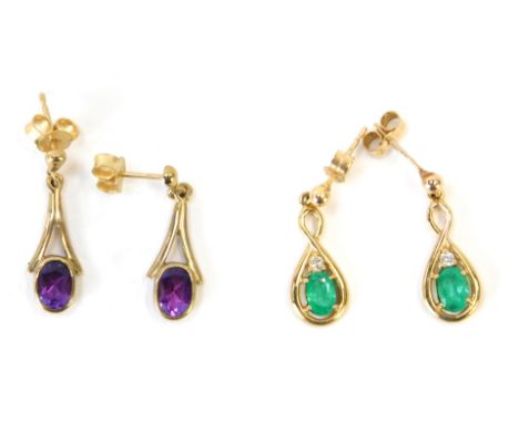 Two pairs of 9ct gold earrings, comprising a pair of emerald and diamond drop earrings, and a pair of amethyst drop earrings,