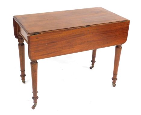 A Victorian mahogany Pembroke table, with frieze drawer, turned legs and castors, bearing the maker's label of James Shoolbre