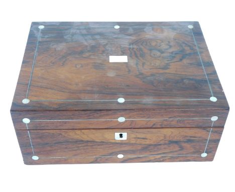A 19thC rosewood writing box, mother of pearl inlaid with circle and rectangular points and key plate, with a fitted interior