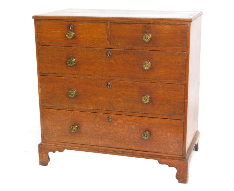 A George III oak chest, of two short and three graduated drawers, with pressed brass knob handles, and bracket feet, 100cm wi