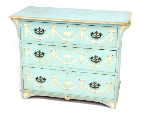 An early 20thC blue and white painted chest of drawers, the rectangular top with acanthus leaf border, above three drawers ea