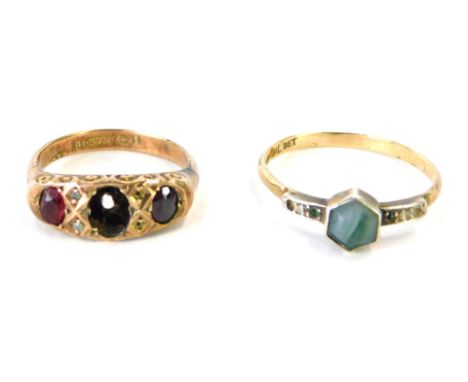 Two dress rings, comprising a 9ct gold and garnet set gypsy ring (one stone missing), size K, and a 9ct gold Art Deco style d