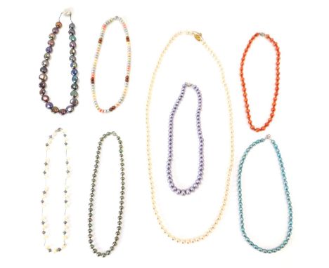 A group of eight cultured pearl necklaces, to include a purple lustre finish strand, orange lustre finish strand, multi stone