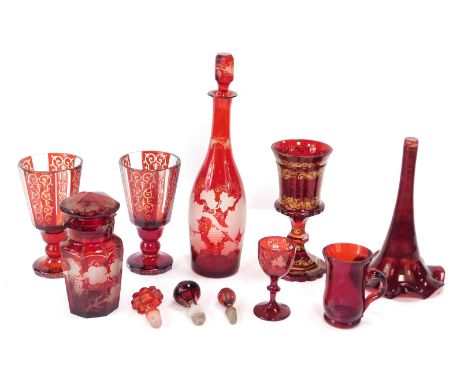 A group of 19thC Bohemian ruby flashed glass ware, comprising a trumpet vase, pair of goblets, decanter and stopper, various 