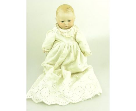 A GERMAN BISQUE HEADED BABY DOLL, INDISTINCTLY MARKED
