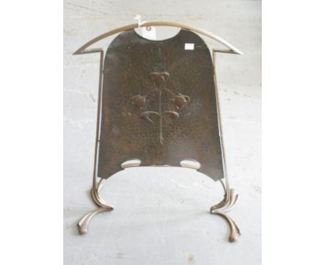 AN ARTS AND CRAFTS OXIDISED BRASS FIRESCREEN, CIRCA 1905