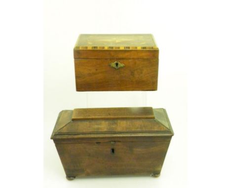 A VICTORIAN INLAID WALNUT TEA CADDY AND A VICTORIAN MAHOGANY TEA CADDY OF SARCOPHAGUS SHAPE
