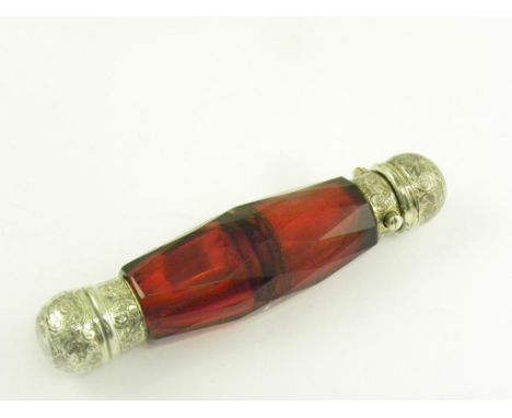 A VICTORIAN SILVER GILT MOUNTED RUBY GLASS COMBINATION SCENT AND SALTS BOTTLE, LONDON 1874 