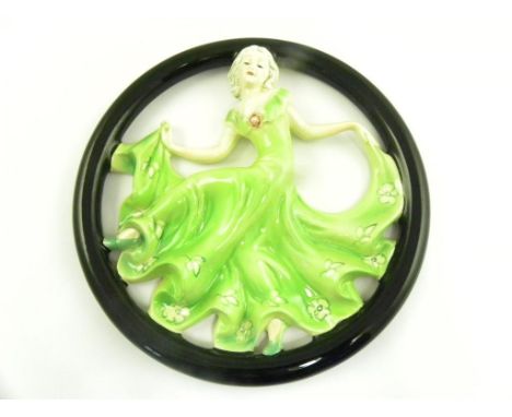 A GOEBEL ART DECO EARTHENWARE OPENWORK CIRCULAR PLAQUE OF A LADY IN A GREEN DRESS, 1930'S