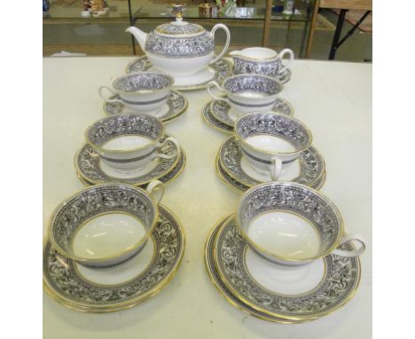 A WEDGWOOD BONE CHINA FLORENTINE PATTERN TEA SERVICE