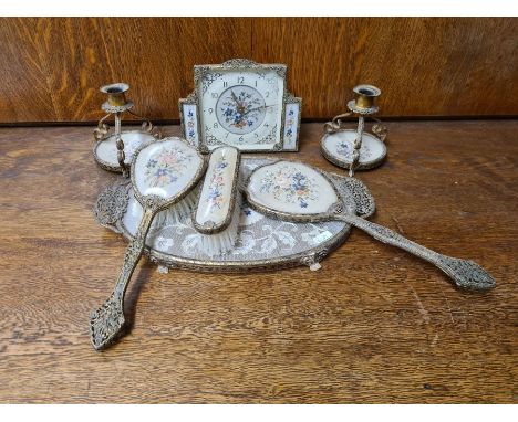 The Regent petit point dressing table set with clock and candlesticks.